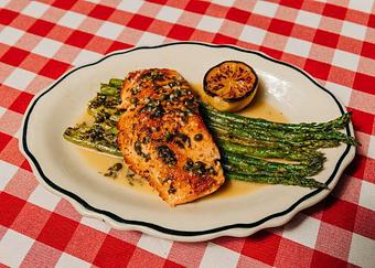 Product: Fresh Faroe Island Salmon in a zesty piccata sauce served with roasted asparagus - Il Porcellino in River North - Chicago, IL Italian Restaurants