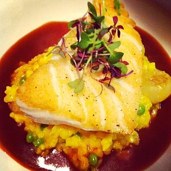 Product: Sea Bass with Saffron Risotto - Iva Lee's in San Clemente - San Clemente, CA American Restaurants
