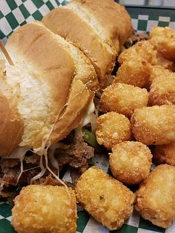 Product: Philly with tots - Jersey's Bar in Junction City, OR Bars & Grills