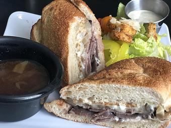 Product: Our French Onion Dip on toasted baguette with caramelized onions, horseradish sauce and au jus for dipping. - Jester's Cafe in WILMINGTON, NC American Restaurants