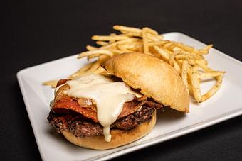 Product: Smothered Love Burger - Kloomachin Kitchen at The Point Casino in Kingston, WA American Restaurants