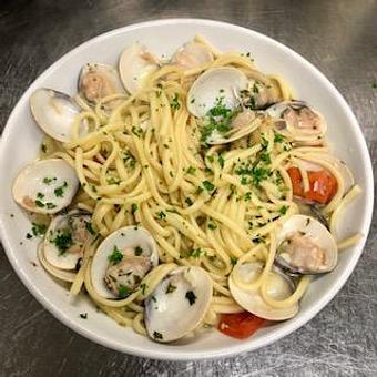 Product: Linguine e Vongole - Linguine pasta with fresh clams, diced tomatoes and garlic in a white wine butter sauce - La Trattoria Oceanside in Key West Airport - Key West, FL Italian Restaurants