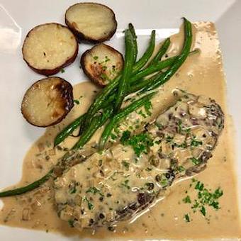 Product: Bistecca al Pepe - New York strip steak pan seared with shallots, green peppercorn, brandy and cream - La Trattoria Oceanside in Key West Airport - Key West, FL Italian Restaurants