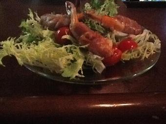 Product: Prosciutto Wrapped Shrimp over Frisée Salad - Lancaster Tavern B & B Restaurant in Lancaster, VA American Restaurants