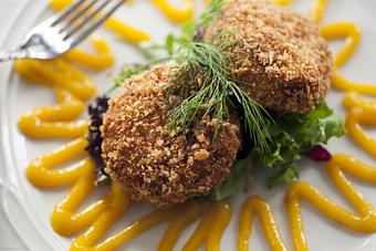 Product: Spicy Crawfish Cakes with Mango Purée - Landmark Restaurant at Old Rittenhouse Inn in Bayfield, WI American Restaurants