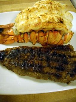 Product: New York Strip Steak and Lobster Tail - Las Palmeras Restaurante in Miami, FL Seafood Restaurants