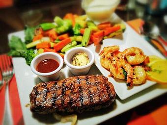 Product: New York Strip Steak and Jumbo Shrimp - Las Palmeras Restaurante in Miami, FL Seafood Restaurants