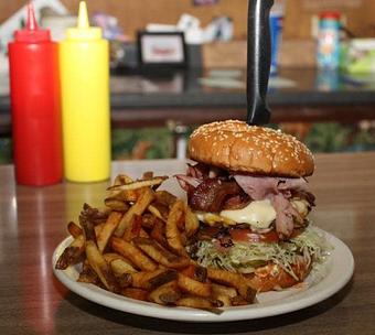 Product: Livestock burger W/home fries - Livestock Cafe in Okanogan, WA Hamburger Restaurants