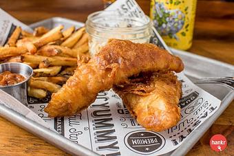 Product: Two pieces Alaskan cod hand-battered in Belgian-style witbier; served with Frites, slaw and choice of two sauces - Longtable Beer Cafe in Downtown Middleton - Middleton, WI American Restaurants