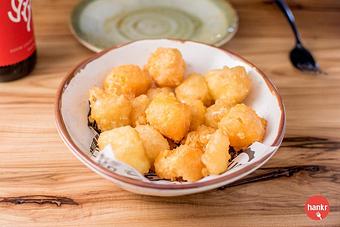 Product: Clock Shadow Creamery cheddar curds, hand-battered in Belgian-style witbier - Longtable Beer Cafe in Downtown Middleton - Middleton, WI American Restaurants