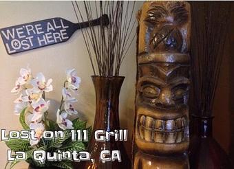 Product: A nicely carved Tiki keeps an eye on things - Lost on 111 Grill in La Quinta, CA American Restaurants