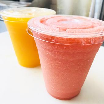 Product: Freshly squeezed OJ (back) and our Romantic smoothie (front) - Lovebirds Cafe & Bakery in Pasadena, CA Bakeries