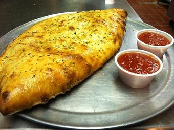 Product: Large Calzone - Lucy's New York Style Pizzeria in Idaho Falls, ID Italian Restaurants