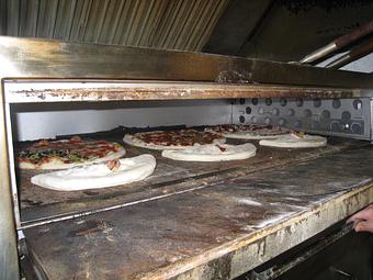Product: cooking on stone decks - Lucy's New York Style Pizzeria in Idaho Falls, ID Italian Restaurants