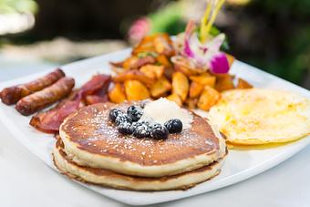 Product: 2 pancakes, 2 eggs your way, breakfast potatoes, applewood smoked bacon, link sausage (sub turkey bacon or turkey sausage $2, add topping $3) - M.a.c. 24/7 in Waikiki - Honolulu, HI American Restaurants