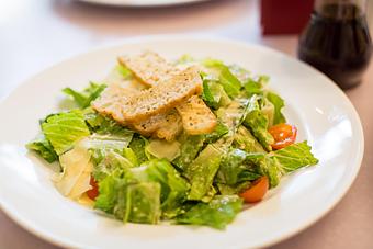 Product: romaine hearts, herbed croutons, shaved parmesan cheese - M.a.c. 24/7 in Waikiki - Honolulu, HI American Restaurants