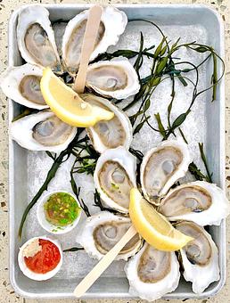 Product: Wellfleet Oysters on the half shell - Mac's Shack Wellfleet in Wellfleet, MA American Restaurants