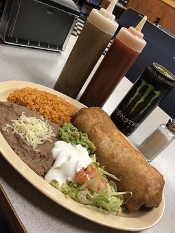 Product: King Burrito Chimichanga Meal with rice and beans - Manny’s Burrito Express in Schaumburg, IL Mexican Restaurants