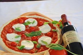 Product: Buffalo mozzarella pizza with vino - Marina's Bar & Grill in Miami, FL American Restaurants