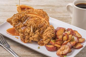 Product: Chicken & Waffle (pictured with house potatoes) - Mason's Grill in Baton Rouge, LA American Restaurants