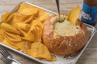 Product: Spinach & Artichoke Dip in Bread Bowl - Mason's Grill in Baton Rouge, LA American Restaurants