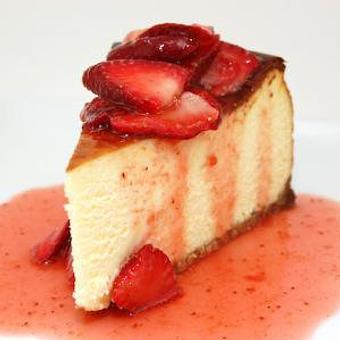 Product: Cheesecake pictured with strawberry compote topping - Mason's Grill in Baton Rouge, LA American Restaurants