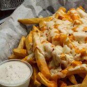 Product: Top w/ Hand grated cheddar and pepper jack cheeses - Moby's Bar & Grill in Metairie, LA Bars & Grills