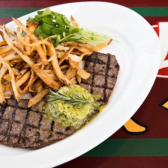 Product: Steak Classique with maître d'hôtel butter ~ served with our signature hand-cut frites - Mon Ami Gabi in Lincoln Park West - Chicago, IL French Restaurants