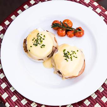 Product: Classic Eggs Benedict ~ two poached eggs, canadian bacon, and hollandaise sauce on homemade english muffin - Mon Ami Gabi in Lincoln Park West - Chicago, IL French Restaurants