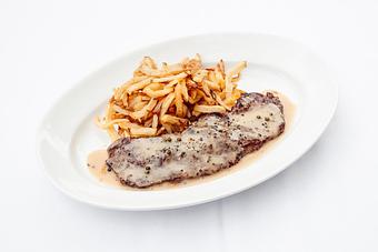 Product: topped with brandy peppercorn sauce - Mon Ami Gabi in Lincoln Park West - Chicago, IL French Restaurants