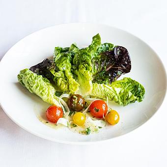 Product: Little Gem salad - shaved fennel & pollen, confit tomatoes - Mon Ami Gabi in Reston Town Center - Reston, VA French Restaurants