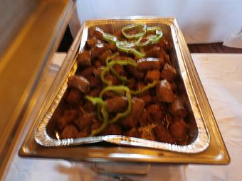 Product: Generous chunks of Kielbasa slow cooked in beer, onions & sweet peppers.  Great as an appetizers or a perfect complement to a pig roast. - Ms Piggie's BBQ in Coopersville, MI Barbecue Restaurants