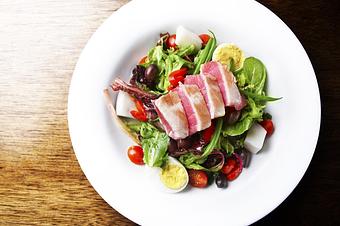 Product: Seared tuna, mixed greens, boiled potatoes, boiled egg, cherry tomatoes, green beans, kalamata olives, roasted red peppers - Novecento Brickell in Miami, FL Steak House Restaurants