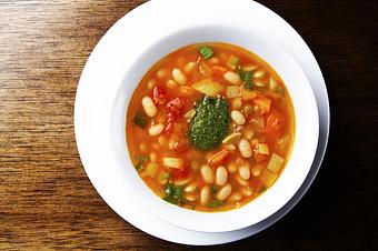 Product: Vegetarian soup, navy beans, vegetables, pesto - Novecento Brickell in Miami, FL Steak House Restaurants