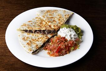 Product: flour tortilla, Monterrey Jack cheese, grilled chicken or beef, sour cream, guacamole, "Pico de Gallo" - Novecento Brickell in Miami, FL Steak House Restaurants