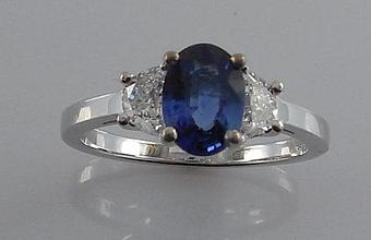 Product: This bride wanted a sapphire & half moon cut diamonds for her ring - Nunez Fine Jewelers in Virginia Beach, VA Jewelry Stores