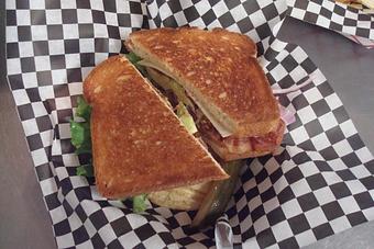 Product: Avocado, Bacon, and Swiss Cheese. Served with Chips and a Pickle. - Nutshell Eatery & Bakery in Granbury, TX American Restaurants