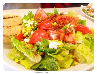 Product: Field greens, roasted pepper, artichokes, green beans, egg, olives, marinated tomato, potato & lemon thyme vinaigrette - Olive Pit Grill Brea - Catering in Brea, CA Greek Restaurants Product: Field greens, roasted pepper, artichokes, green beans, egg, olives, marinated tomato, potato & lemon thyme vinaigrette - Olive Pit Grill Brea - Catering in Brea, CA Greek Restaurants