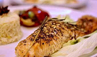 Product: Salmon and saffron rice - Orabis Greek Mediterranean Restaurant in Cedar Hill, TX Mediterranean Restaurants