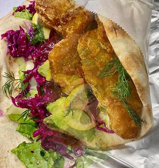 Product: Three-piece Alaskan Amber beer battered. Wild Alaska cod
or Three-piece Alaskan Pollock with red cabbage lettuce. - Orabis Greek Mediterranean Restaurant in Cedar Hill, TX Mediterranean Restaurants