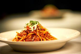 Product: Hollow spaghetti tossed with a lightly spiced tomato sauce with pancetta and onion - Pasta D'arte Trattoria Italiana in Chicago, IL Italian Restaurants