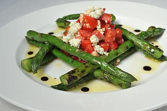 Product: Grilled asparagus, marinated tomatoes and gorgonzola dressed with EVOO and balsamic reduction - Pasta D'arte Trattoria Italiana in Chicago, IL Italian Restaurants