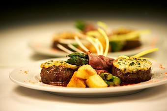 Product: Twin 4oz. filet mignon medallions pan seared and served in a truffled mustard demiglace topped with a Parmesan cheese crust served with roasted potatoes and asparagus wrapped in prosciutto - Pasta D'arte Trattoria Italiana in Chicago, IL Italian Restaurants