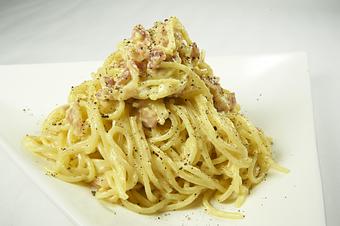 Product: Spaghetti pasta tossed with pancetta, olive oil and white wine served in a creamy sauce of egg and parmesan - Pasta D'arte Trattoria Italiana in Chicago, IL Italian Restaurants