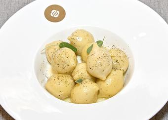 Product: Stuffed "Cacio & Pepe" potato gnocchi with butter and sage sauce. - Patavini in Columbus Circle - New York, NY Italian Restaurants