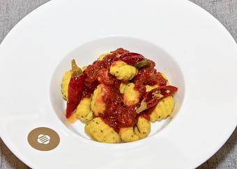 Product: Turmeric, chickpeas and chia seeds potato gnocchi with arrabbiata spicy tomato sauce. - Patavini in Columbus Circle - New York, NY Italian Restaurants