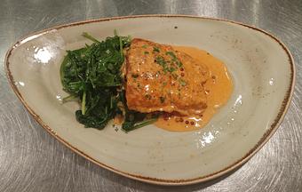 Product: Pan seared salmon with pink brandy peppercorn sauce with spinach - Pazzo Pomodoro in Vienna, VA Italian Restaurants