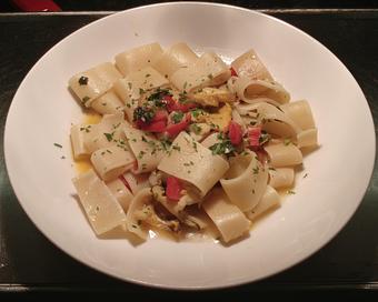Product: Ring shaped pasta with conch meat, cherry tomatoes, chili flakes in a white wine sauce - Pazzo Pomodoro in Vienna, VA Italian Restaurants