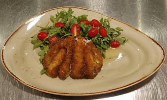 Product: Lightly breaded flounder topped with arugula and cherry tomatoes - Pazzo Pomodoro in Vienna, VA Italian Restaurants