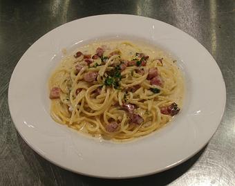 Product: Spaghetti tossed in a cream sauce of beaten eggs, parmesan cheese and smoked pancetta - Pazzo Pomodoro in Vienna, VA Italian Restaurants